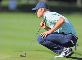  ?? AARON DOSTER, USA TODAY SPORTS ?? Jordan Spieth lines up a putt on No. 13 during his 6-under-par opening round at the Memorial.