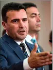  ??  ?? „ Macedonian Prime Minister Zoran Zaev signed the agreement.