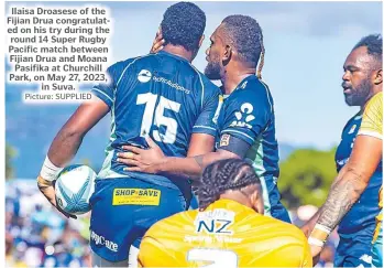  ?? Picture: SUPPLIED ?? Ilaisa Droasese of the Fijian Drua congratula­ted on his try during the round 14 Super Rugby Pacific match between Fijian Drua and Moana Pasifika at Churchill Park, on May 27, 2023, in Suva.