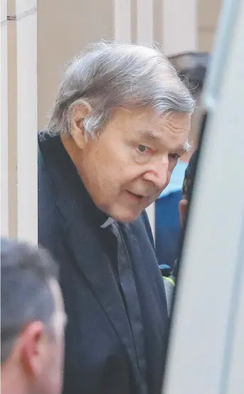  ?? Picture: ALEX COPPEL ?? DISAPPOINT­ED: George Pell is led away in a prison van after losing his appeal.