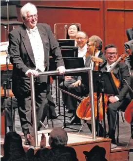  ?? [PHOTO BY STEVE SISNEY, THE OKLAHOMAN] ?? Oklahoma City Philharmon­ic music director Joel Levine conducts introduces South Korean guest solo violinist Chee-Yun on Saturday, Feb. 3, 2018 in Oklahoma City, Okla.