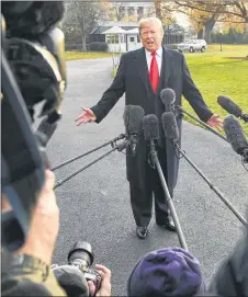  ?? AP PHOTO ?? President Donald Trump speaks to reporters on the South Lawn of the White House in Washington, Monday, Dec. 4, 2017, before heading to Utah.