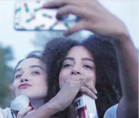  ?? ELEVATION PICTURES ?? Canadian actress Hayley Law, right, shines as the best friend of a sex columnist played by Jessica Barden in The New Romantic.