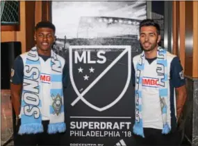  ?? MIKE REEVES -- FOR DIGITAL FIRST MEDIA ?? Union Homegrown signings Mark McKenzie, left, and Matt Real pose for pictures at the 2018 MLS SuperDraft at the Pennsylvan­ia Convention Center on Friday.