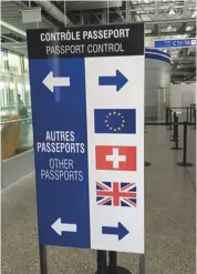  ??  ?? Switzerlan­d is not in the EU and, following our referendum result, in respect of passports, Swiss airports wasted no time in putting the Union Jack alongside their own national flag.