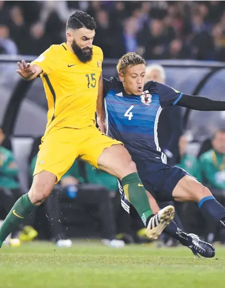  ?? Picture: AP PHOTO ?? Mile Jedinak and the Socceroos have been urged to get their physical on when they face Japan on Thursday.