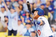  ?? MARK J. TERRILL/ASSOCIATED PRESS FILE ?? Dodgers third baseman Justin Turner signed a 4-year deal to stay in Los Angeles. He hit 27 home runs last season.