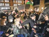  ?? Fatih Aktas Anadolu ?? POLICE TAKE students into custody at New York University in New York on Monday. Recent arrests in that city have sparked further pro-Palestinia­n protests across the country, including at Stanford, right, on Monday.