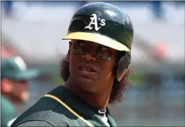  ?? RONALD MARTINEZ — GETTY IMAGES ?? The A’s Khris Davis, even during an off year, could make hard contact in the wild-card game.