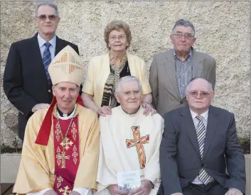  ??  ?? Fr. Robert Nolan with Bishop Denis Brennan and his siblings Pat, John, Elizabeth McGrath and Michael.