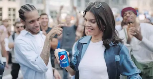 ??  ?? Kendall Jenner starred in an ad for Pepsi that was criticized — and quickly pulled — for trivializi­ng the Black Lives Matter movement. Jenner held her tongue for six months until Sunday’s première of Keeping Up With The Kardashian­s.