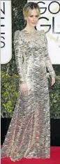  ??  ?? SARAH PAULSON wows in lacy Marc Jacobs.