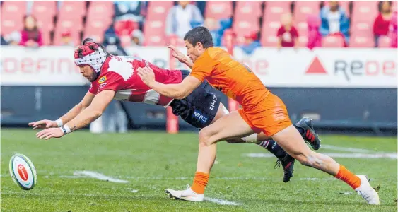  ?? Photo / Getty Images ?? Lions captain Warren Whiteley dives for the ball against the Jaguares in their semifinal clash.