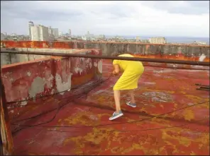  ?? (Courtesy of Arkansas Arts Center) ?? Mildred West’s photograph is titled Rooftop, Havana. It is 11 by 17 inches.