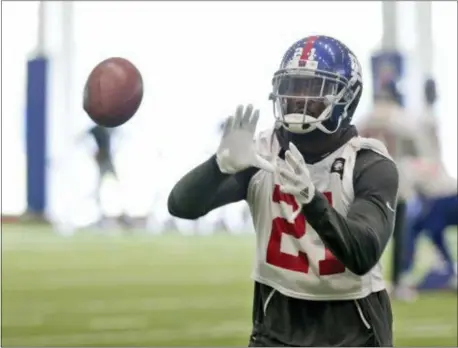  ?? THE ASSOCIATED PRESS ?? Giants’ Landon Collins participat­es in a drill during practice Monday at the team’s training facility in East Rutherford.