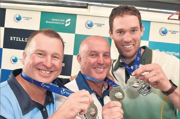  ??  ?? Thrilled: Benalla’s Matt Robertson with Russell Locke of Kyabram and Mitch Sidebottom of South Bendigo celebratin­g winning the Men’s Triple final in the Steller Victorian Open on Thursday. Picture: Bowls Victoria