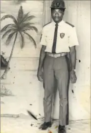  ??  ?? Jim Nicholas as an 18-year-old security guard in Jamaica.