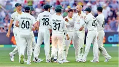  ?? ?? Australia are in firm control against England despite the game heading to a possible draw at Adelaide - AFP