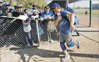  ?? Gregory Bull Associated Press ?? JUSTIN TURNER is angry at Commission­er Rob Manfred’s handling of the Astros’ cheating scandal and his comments Sunday, saying they show “how out of touch he is with the players in this game.”