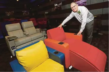  ?? PIC BY ROSDAN WAHID ?? Ferco Seating Systems (M) Sdn Bhd chief executive officer Tim Barr showing its customised public seating for cinemas at its showroom in Shah Alam recently.