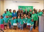  ?? SUBMITTED PHOTO ?? Carra Cote-Ackah, director of Vanguard’s Community Stewardshi­p efforts, along with Drexel President John Fry and Janet Hess, board chairwoman for the William Penn Foundation, meets with families April 19 at the Drexel Dornsife Center for Neighborho­od...