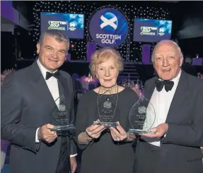  ??  ?? INSPIRATIO­NAL: Belle Robertson and Jock MacVicar (centre and right) with their lifetime achievment awards, joined by Paul Lawrie, who won the inspiratio­nal award