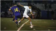  ?? The Sentinel-record/krishnan Collins ?? ■ Lakeside’s Kole Kelley (14) tries to steal the ball from Hot Springs’ Alexander Pacheco (8) at Chick Austin Field Friday night.