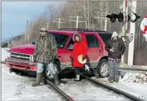  ?? ANDREW VAUGHAN/ THE CANADIAN PRESS ?? Protesters block the CN rail line between Halifax and Truro in Nova Scotia as part of the Idle No More protests Friday.