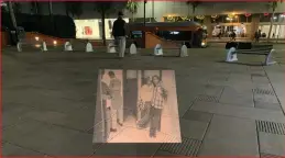  ??  ?? Reynaldo Rivera’s Photograph Projected in Open Mouth by Nancy Lupo, Pershing Square November 2019, photo by Fiona Alison Duncan