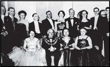  ??  ?? Archibald Hall, main picture and second left back row, with society group Civic Reception, held by the mayor of Torquay, after talking his way in, and far left, Michael Kitto