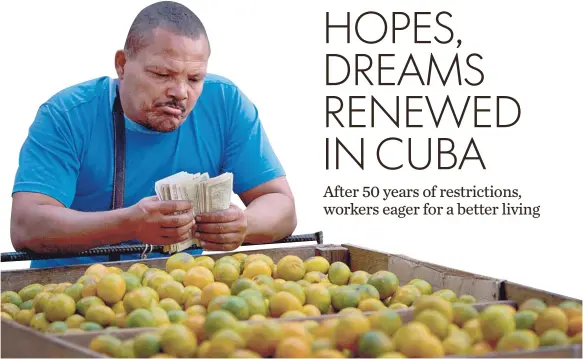  ?? RAMON ESPINOSA, AP ?? A fruit vendor counts the money he earned selling oranges in Havana. The Cuban government has made improvemen­ts to the agricultur­al sector in recent years.
