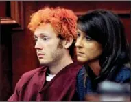  ?? AP photo ?? Suspected theater shooter James Holmes appears in Arapahoe County District Court with defense attorney Tamara Brady in Centennial, Colo., July 23.