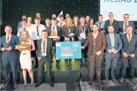  ??  ?? Proud line-up of the winners of Lantra Scotland’s Awards for Land-based and Aquacultur­e Skills.