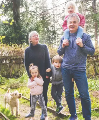  ?? ARLEN REDEKOP ?? Pete Mcmartin and his wife Susan love spending time and caring for their grandkids Ewan, five, Pim, three, and Hazel, two, along with their dog, Bess, at their Tsawwassen home.