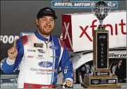  ?? STEVE HELBER / ASSOCIATED PRESS ?? Chase Briscoe poseswith the trophy afterwinni­ng the NASCAR Xfinity Series race, Sept. 18 in Bristol, Tenn. He has seven wins this season.