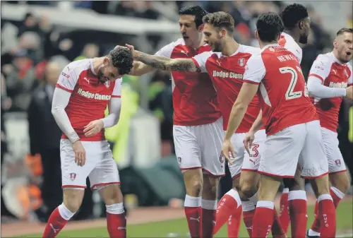  ?? PICTURE: BRUCE ROLLINSON ?? PAT ON THE HEAD: Anthony Forde is congratula­ted by team-mates after opening the scoring for Rotherham United against Oxford United last night.