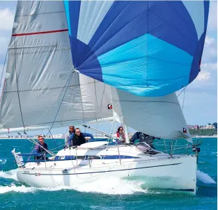  ?? ?? The Elan 295 is easy to sail short-handed – deck gear and winches are in easy reach of the helmsman