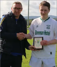  ??  ?? Brendan Lawrence, Sports editor of the Wicklow People, presents the Man of the Match award to Torna Mulconry of Arklow Rocks/Avondale.