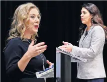  ?? [DOUG HOKE/ THE OKLAHOMAN] ?? U.S. Rep. Kendra Horn, left, and state Sen. Stephanie Bice speak at a 5th Congressio­nal District Forum on Wednesday hosted by the Edmond Chamber of Commerce.