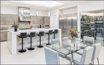  ?? Luxury Homes of Las Vegas ?? The Summerlin home Golden Knights coach Bruce Cassidy bought for $4.9 million in October features a gourmet kitchen with a large walk-in pantry.