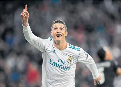  ?? GABRIEL BOUYS/AFP/GETTY IMAGES ?? The Cristiano Ronaldo era at Real Madrid is over. After nine years in Spain, Ronaldo has signed with Italian club Juventus.