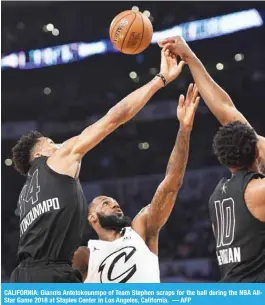  ??  ?? CALIFORNIA: Giannis Antetokoun­mpo of Team Stephen scraps for the ball during the NBA AllStar Game 2018 at Staples Center in Los Angeles, California. — AFP