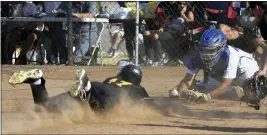  ?? PHOTO BY JOHN MCCOY ?? St. Bernard's Jacob Myrow is tagged out by Baldwin Park catcher Michael Martinez in the seventh inning on Tuesday in a CIF-SS Division 7semifinal.