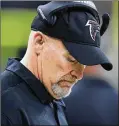  ??  ?? Falcons coach Dan Quinn shows his dejection as the Saints took a 203 lead during the third quarter, but his team can still clinch a playoff berth with a victory next week.