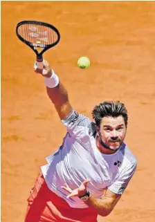  ?? AFP ?? Die beiden Schweizer Tennis-Asse Roger Federer und Stan Wawrinka (r.) sind einander ähnlicher, als viele meinen.