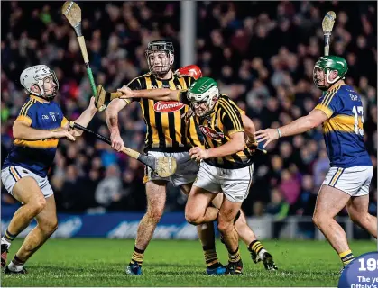  ??  ?? ON THE RUN: Paddy Deegan of Kilkenny races past Tipp’s Niall O’Meara and John O’Dwyer same as every other year.
In terms of looking ahead to the play-offs, it is a bit strange when you could have a scenario where Offaly win one match in Division 1B...
