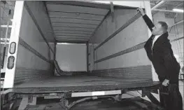  ?? Arlyn McAdorey Associated Press ?? POLICE SAY this truck was used in the multimilli­on-dollar heist from Toronto’s main airport. Nine people face charges, including two who worked for Air Canada.