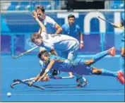  ?? GETTY ?? India’s Vivek Sagar Prasad dives in to thwart a German attack during the bronze medal play-off in Tokyo on Thursday.