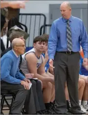  ?? PHOTO PROVIDED ?? Michael Edison (standing) and assistant Jack Edison will have another Laville boys basketball team ready for action this season.