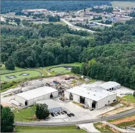  ?? HYOSUB SHIN /HYOSUB.SHIN@AJC.COM ?? A photo shows the remnants of Metro Site’s recycling facility that burned down last year. SK Battery has alleged the mistake that caused discarded battery cells to arrive at the facility was made by a shipping contractor.